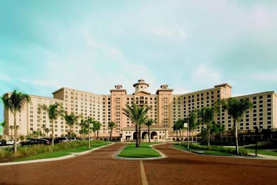 Resort exterior with palm trees in Orlando